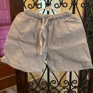 Super cute boys blue and white seersucker swimming shorts. Perfect for summer!!